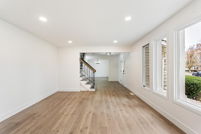 7723 W 157th St, Orland Park, IL 60462 - unfurnished room featuring stairs, recessed lighting, light wood-type flooring, and baseboards