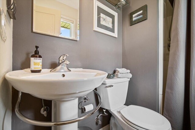315 S Bone Dr, Normal, IL 61761 - full bath featuring toilet and a shower with shower curtain