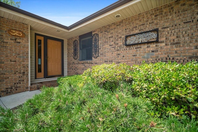 315 S Bone Dr, Normal, IL 61761 - doorway to property with brick siding