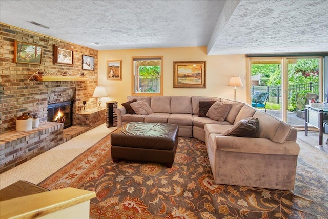 315 S Bone Dr, Normal, IL 61761 - carpeted living area with a textured ceiling and a brick fireplace