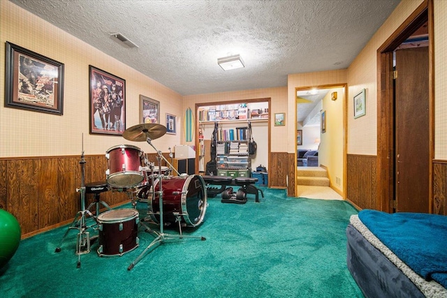 315 S Bone Dr, Normal, IL 61761 - interior space with carpet, wainscoting, wood walls, and a textured ceiling