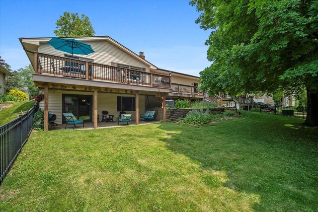 315 S Bone Dr, Normal, IL 61761 - back of house featuring a wooden deck, a fenced backyard, a patio, and stairs