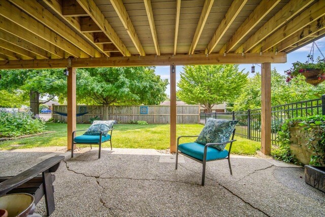 315 S Bone Dr, Normal, IL 61761 - fenced backyard featuring a patio area