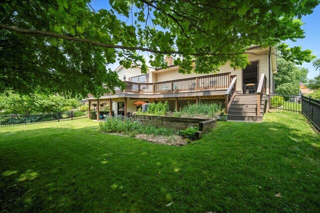 315 S Bone Dr, Normal, IL 61761 - back of house featuring a fenced backyard, stairs, and a wooden deck