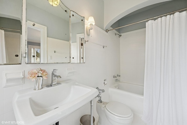 1025 Sheridan Rd, Wilmette, IL 60091 - full bath with a sink, toilet, shower / bath combo with shower curtain, and tile walls