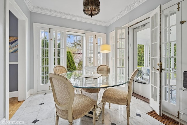 1025 Sheridan Rd, Wilmette, IL 60091 - dining space featuring french doors, baseboards, and light tile patterned flooring