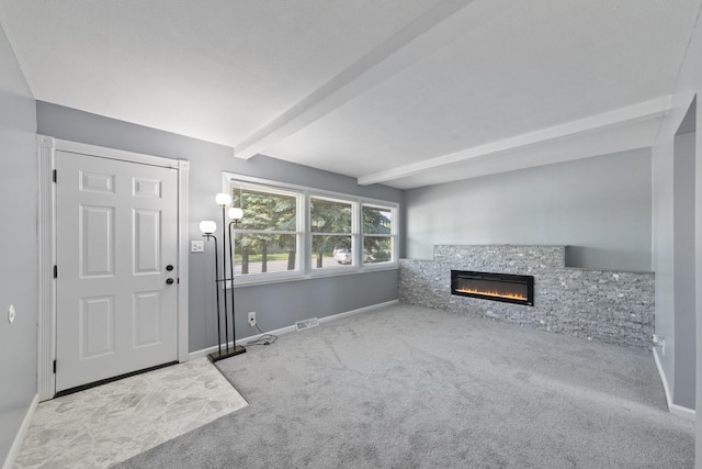 15603 Park Ln, South Holland, IL 60473 - foyer with carpet floors, beamed ceiling, baseboards, and a fireplace