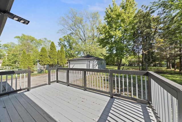 15603 Park Ln, South Holland, IL 60473 - deck featuring an outdoor structure, a garage, and view of scattered trees
