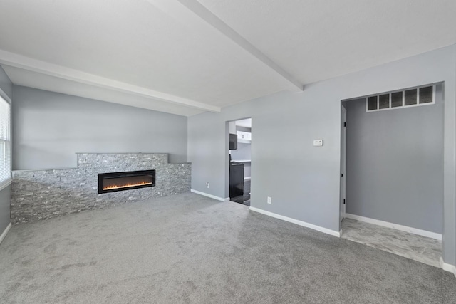 15603 Park Ln, South Holland, IL 60473 - unfurnished living room with carpet floors, a stone fireplace, and baseboards