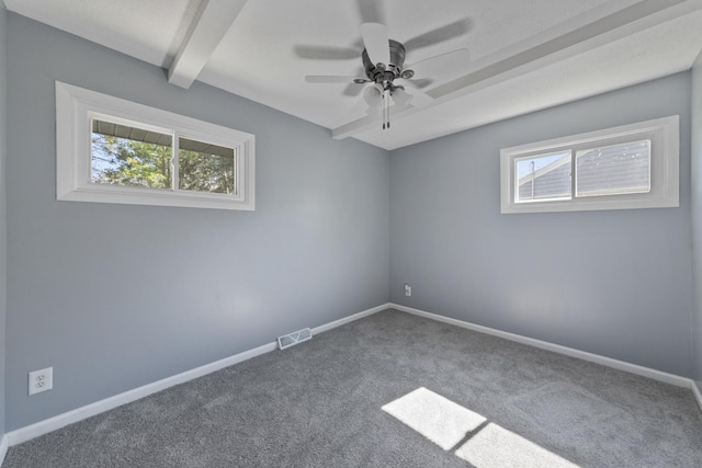 15603 Park Ln, South Holland, IL 60473 - spare room with healthy amount of natural light, carpet flooring, beamed ceiling, ceiling fan, and baseboards