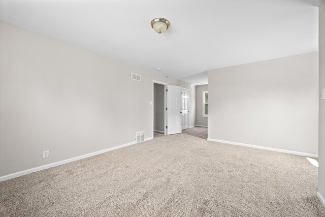 4117 W 99th St, Oak Lawn, IL 60453 - carpeted empty room featuring baseboards