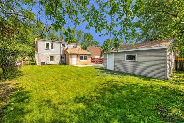 4117 W 99th St, Oak Lawn, IL 60453 - back of property with an outdoor structure and central AC
