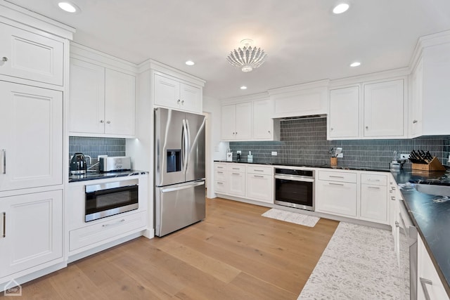 9317 Firth Ct, Lakewood, IL 60014 - kitchen with stainless steel appliances, tasteful backsplash, white cabinetry, and recessed lighting