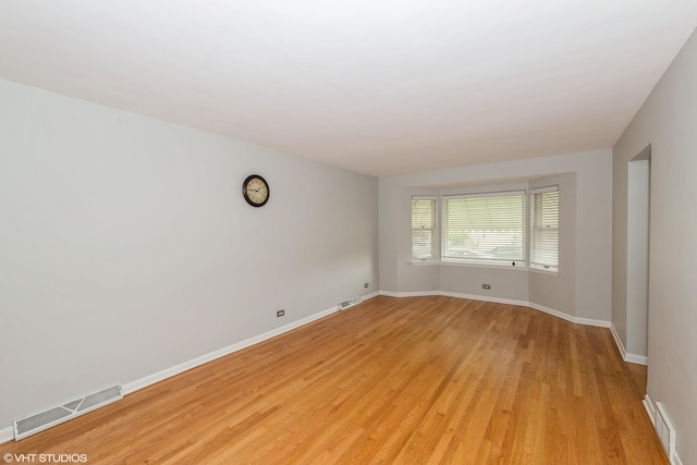 3801 S Lombard Ave, Cicero, IL 60804 - spare room featuring light wood-style flooring and baseboards