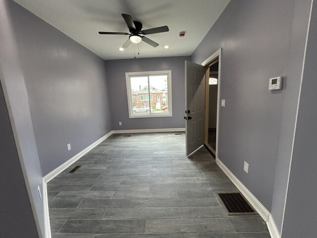 2709 S 59th Ct, Cicero, IL 60804 - unfurnished bedroom featuring dark wood-style flooring, baseboards, recessed lighting, and ceiling fan