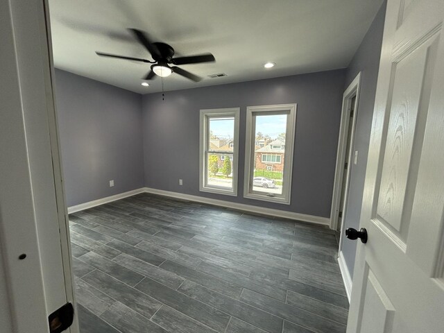 2709 S 59th Ct, Cicero, IL 60804 - unfurnished room with a ceiling fan, baseboards, recessed lighting, and dark wood-style floors