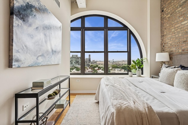 1503 S State St Unit 606, Chicago, IL 60605 - bedroom featuring wood finished floors and a view of city