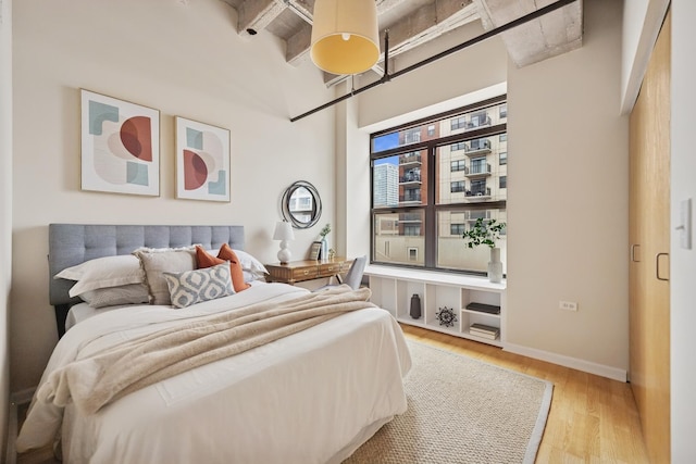 1503 S State St Unit 606, Chicago, IL 60605 - bedroom with wood finished floors and a towering ceiling