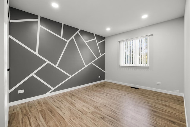 4574 Whitney Dr, Hanover Park, IL 60133 - unfurnished room featuring wood finished floors, baseboards, and recessed lighting