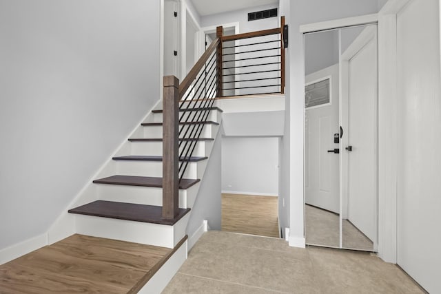 4574 Whitney Dr, Hanover Park, IL 60133 - stairway featuring carpet flooring and baseboards