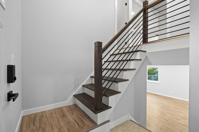 4574 Whitney Dr, Hanover Park, IL 60133 - stairs with baseboards and wood finished floors