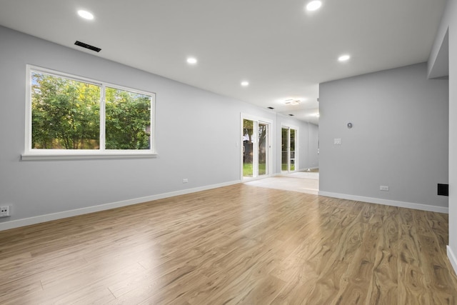 4574 Whitney Dr, Hanover Park, IL 60133 - empty room with light wood finished floors, baseboards, and recessed lighting