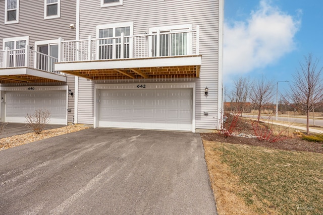 642 Wolverine Dr, Aurora, IL 60502 - view of property exterior with driveway and a garage