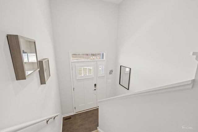 642 Wolverine Dr, Aurora, IL 60502 - entrance foyer with plenty of natural light, dark wood finished floors, and baseboards