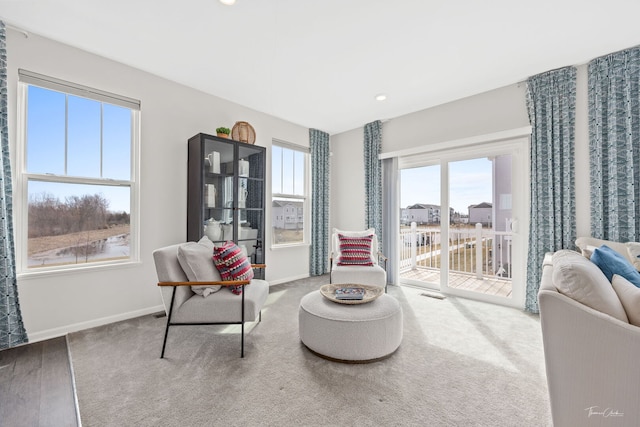 642 Wolverine Dr, Aurora, IL 60502 - sitting room featuring carpet flooring, baseboards, and recessed lighting