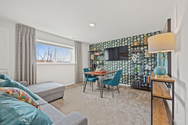 642 Wolverine Dr, Aurora, IL 60502 - living room featuring baseboards, carpet flooring, and an accent wall