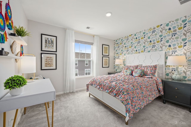 642 Wolverine Dr, Aurora, IL 60502 - carpeted bedroom featuring wallpapered walls, baseboards, and an accent wall