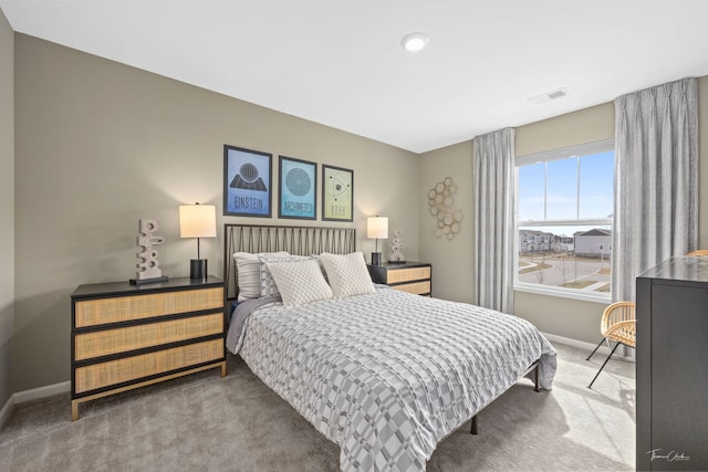 642 Wolverine Dr, Aurora, IL 60502 - carpeted bedroom featuring baseboards