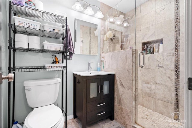 1550 Sandpebble Dr Unit 209, Wheeling, IL 60090 - bathroom featuring a stall shower, toilet, and vanity