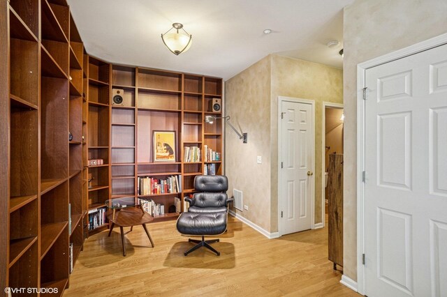 6068 Halloran Ln, Hoffman Estates, IL 60192 - living area with light wood-style floors and baseboards