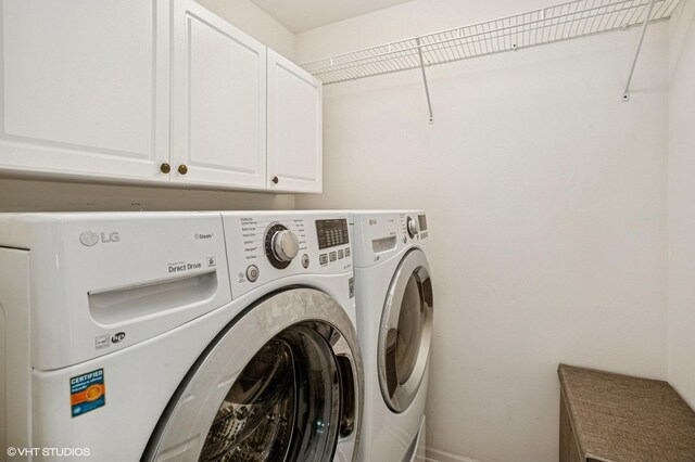 6068 Halloran Ln, Hoffman Estates, IL 60192 - laundry room with washing machine and dryer, cabinet space, and baseboards