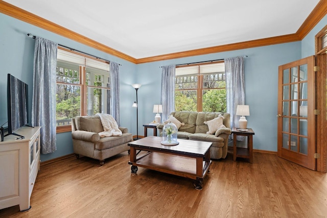 2905 Rose Ave, Mchenry, IL 60050 - living area featuring crown molding, wood finished floors, and baseboards