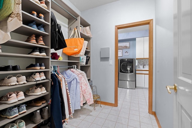 2905 Rose Ave, Mchenry, IL 60050 - walk in closet with washer / clothes dryer, tile patterned flooring, and a sink