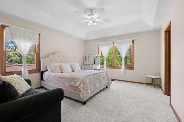 2905 Rose Ave, Mchenry, IL 60050 - bedroom featuring a tray ceiling, baseboards, carpet flooring, and ceiling fan