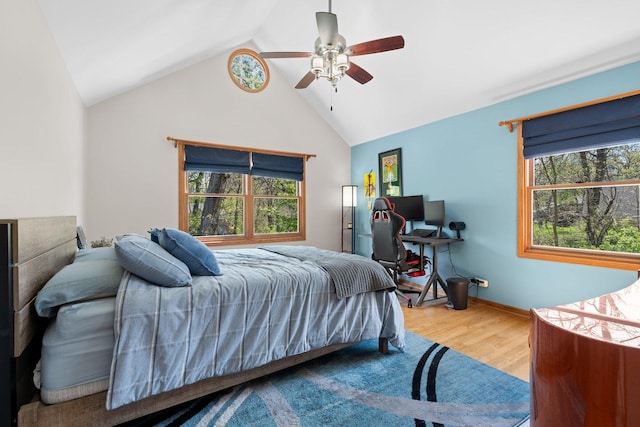 2905 Rose Ave, Mchenry, IL 60050 - bedroom featuring vaulted ceiling, wood finished floors, and a ceiling fan
