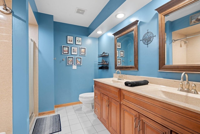 2905 Rose Ave, Mchenry, IL 60050 - bathroom featuring toilet, double vanity, a shower, tile patterned floors, and recessed lighting