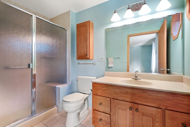 11545 Autobahn Dr E Unit 101, Palos Park, IL 60464 - full bathroom with toilet, vanity, tile patterned floors, and a stall shower