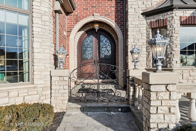 22957 Devonshire Ln, Frankfort, IL 60423 - view of exterior entry featuring brick siding and stone siding