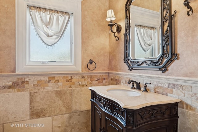 22957 Devonshire Ln, Frankfort, IL 60423 - bathroom featuring vanity, tile walls, and wainscoting