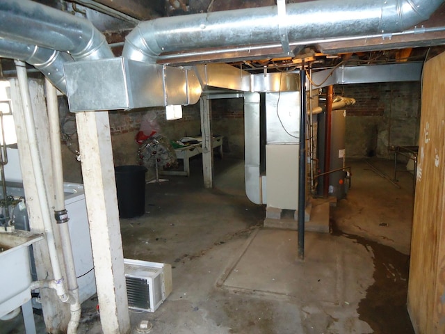 12438 Maple Ave, Blue Island, IL 60406 - unfinished basement featuring gas water heater and heating unit