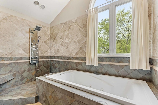 13843 W Stoneoak Way, Homer Glen, IL 60491 - bathroom featuring a whirlpool tub, walk in shower, healthy amount of natural light, tile walls, and vaulted ceiling
