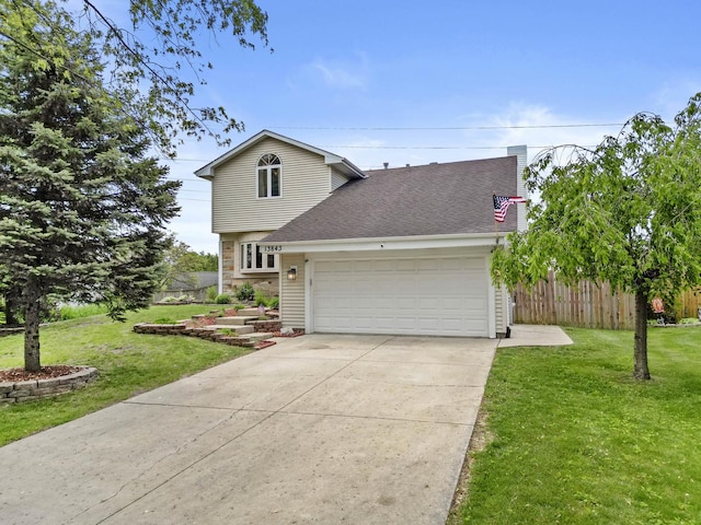 13843 W Stoneoak Way, Homer Glen, IL 60491 - view of home's exterior featuring an attached garage, concrete driveway, and a shingled roof