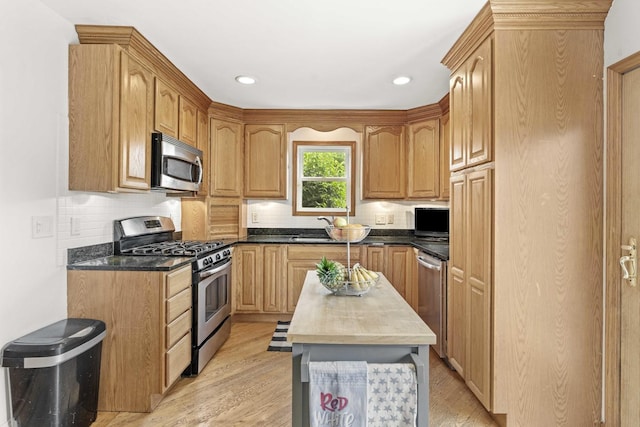 13843 W Stoneoak Way, Homer Glen, IL 60491 - kitchen featuring appliances with stainless steel finishes, light wood-type flooring, tasteful backsplash, and recessed lighting