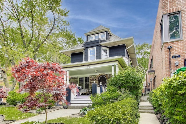 1701 W Chase Ave, Chicago, IL 60626 - american foursquare style home with a porch