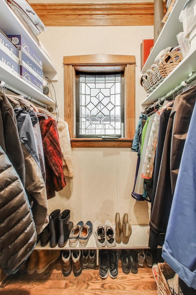 1701 W Chase Ave, Chicago, IL 60626 - walk in closet featuring wood finished floors