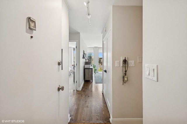 450 W Briar Pl Unit 12G, Chicago, IL 60657 - hallway featuring baseboards and wood finished floors